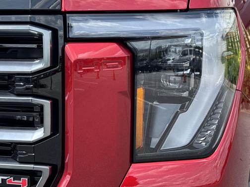 Volcanic Red Tintcoat 2026 GMC Sierra 2500 AT4