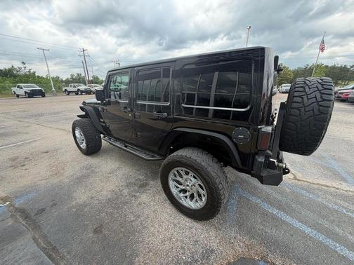 Black 2014 Jeep Wrangler Unlimited Sahara