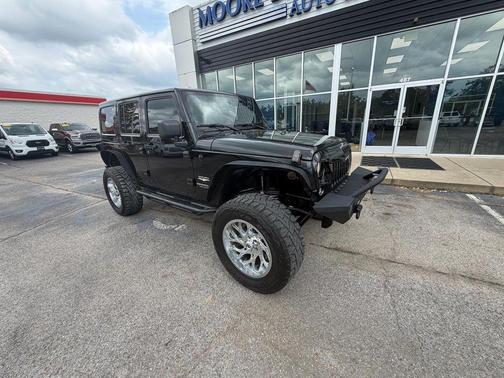 Black 2014 Jeep Wrangler Unlimited Sahara