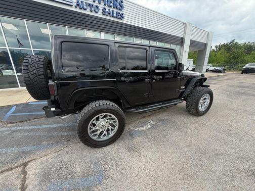 Black 2014 Jeep Wrangler Unlimited Sahara