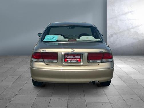 Tan 1997 Mazda 626 DX
