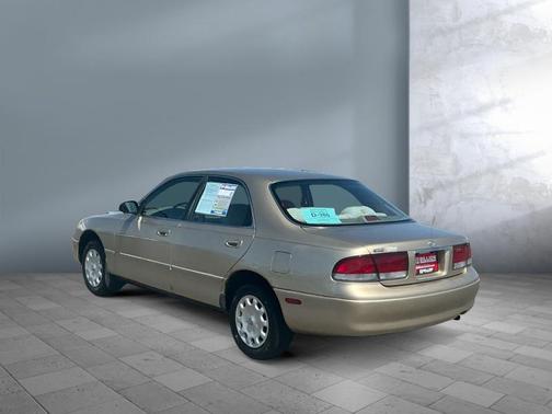 Tan 1997 Mazda 626 DX