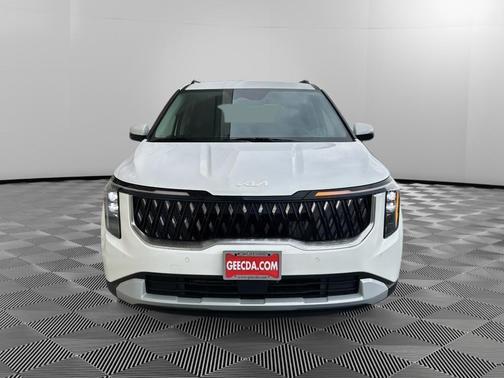 White 2026 Kia Carnival Hybrid EX