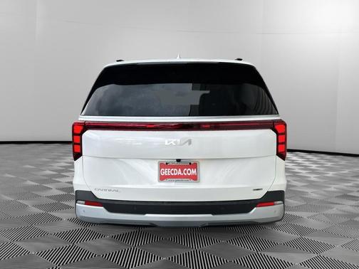 White 2026 Kia Carnival Hybrid EX