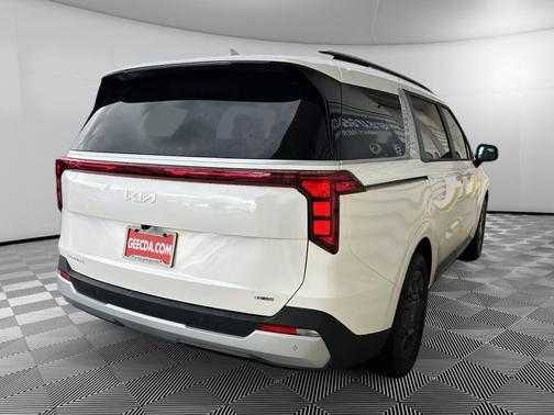 White 2026 Kia Carnival Hybrid EX