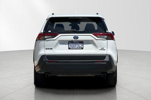 Super White 2019 Toyota RAV4 Hybrid LE
