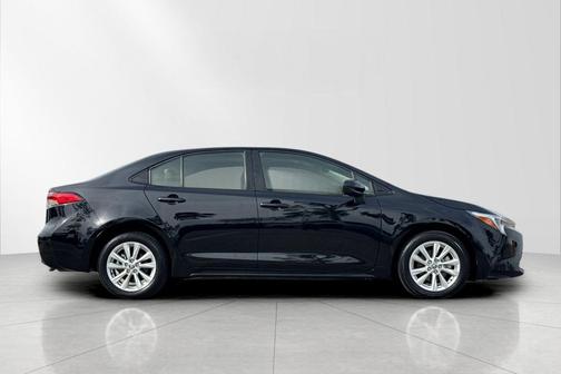 Midnight Black Metallic 2024 Toyota Corolla Hybrid LE