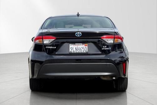 Midnight Black Metallic 2024 Toyota Corolla Hybrid LE
