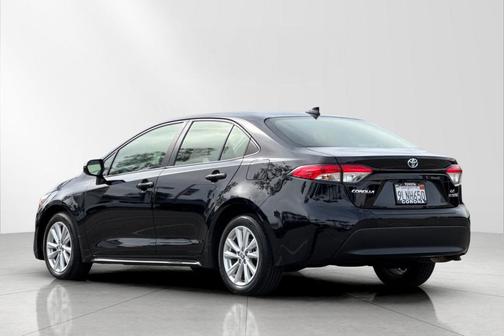 Midnight Black Metallic 2024 Toyota Corolla Hybrid LE