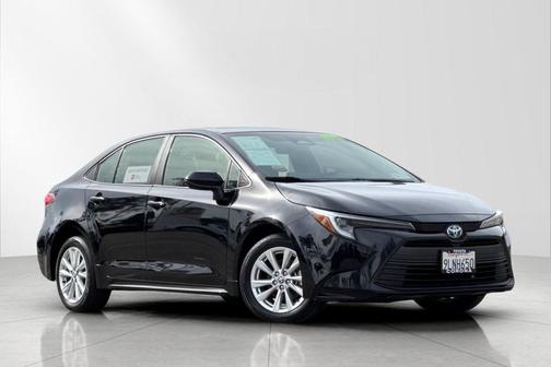 Midnight Black Metallic 2024 Toyota Corolla Hybrid LE