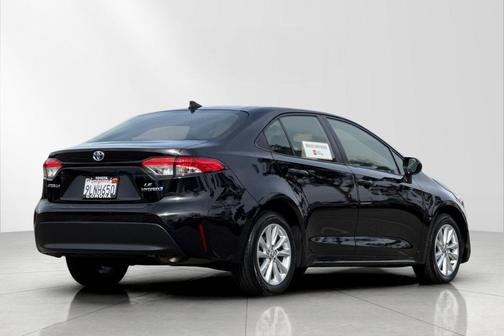 Midnight Black Metallic 2024 Toyota Corolla Hybrid LE