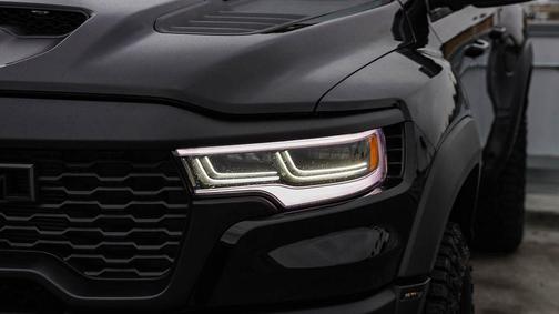 Diamond Black Crystal Pearlcoat 2026 RAM 1500 RHO Crew Cab 4x4 5'7' Box