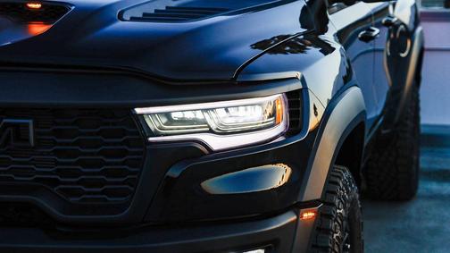 Diamond Black Crystal Pearlcoat 2026 RAM 1500 RHO Crew Cab 4x4 5'7' Box