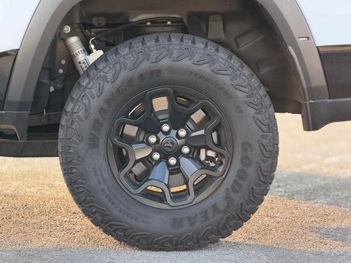 Bright White Clearcoat 2025 RAM 1500 RHO Crew Cab 4x4 5'7' Box