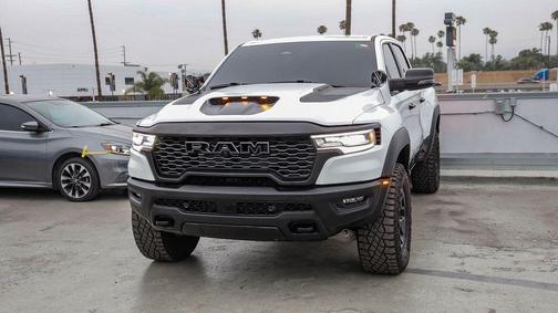 Bright White Clearcoat 2025 RAM 1500 RHO Crew Cab 4x4 5'7' Box