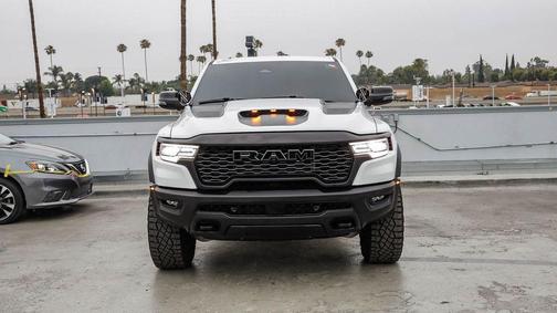 Bright White Clearcoat 2025 RAM 1500 RHO Crew Cab 4x4 5'7' Box