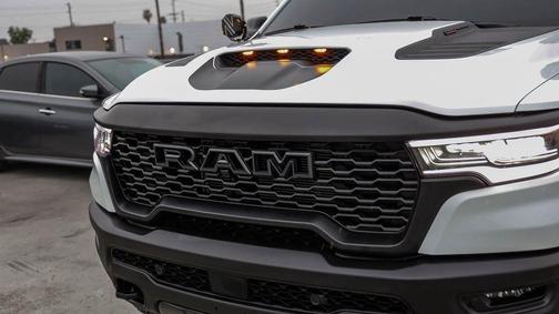 Bright White Clearcoat 2025 RAM 1500 RHO Crew Cab 4x4 5'7' Box