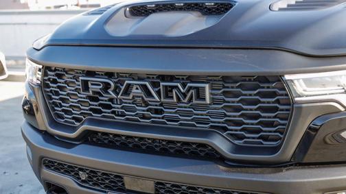 Diamond Black Crystal Pearlcoat 2026 RAM 1500 RHO Crew Cab 4x4 5'7' Box