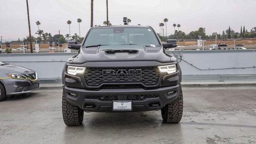 Diamond Black Crystal Pearlcoat 2026 RAM 1500 RHO Crew Cab 4x4 5'7' Box