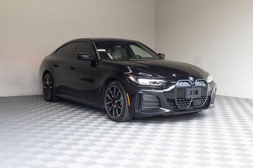 Black Sapphire Metallic 2024 BMW i4 Gran Coupe eDrive40