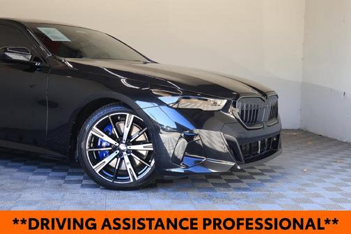 Black Sapphire Metallic 2025 BMW 540 i xDrive