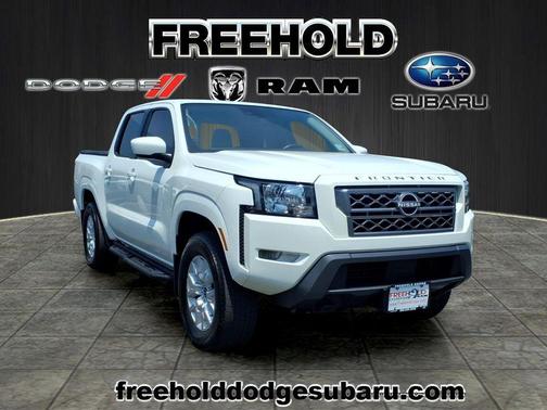Glacier White 2023 Nissan Frontier SV