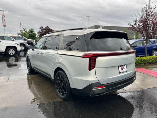 Ivory Silver 2025 Kia Carnival SX Prestige