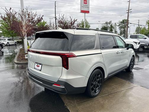 Ivory Silver 2025 Kia Carnival SX Prestige