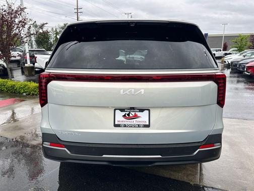 Ivory Silver 2025 Kia Carnival SX Prestige