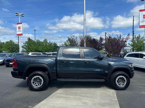 Forged Blue Metallic 2025 RAM 1500 RHO Crew Cab 4x4 5'7' Box