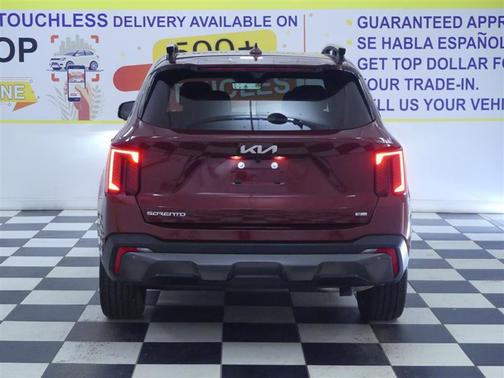 Dawning Red 2024 Kia Sorento SX