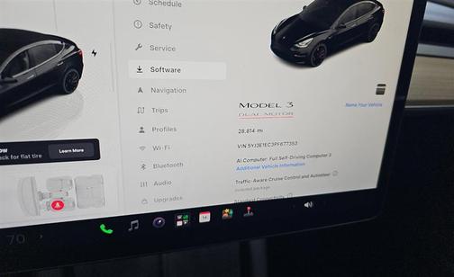 Solid Black 2023 Tesla Model 3 Performance