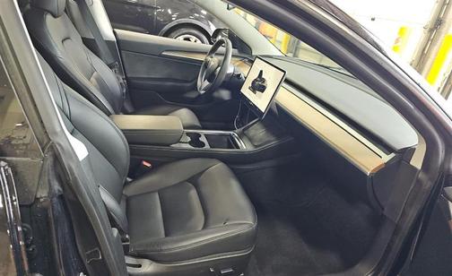 Solid Black 2023 Tesla Model 3 Performance