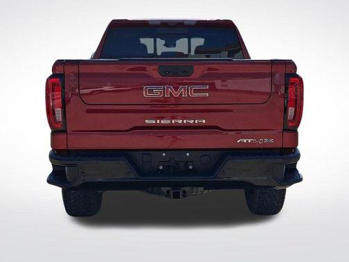 Volcanic Red Tintcoat 2023 GMC Sierra 1500 AT4X