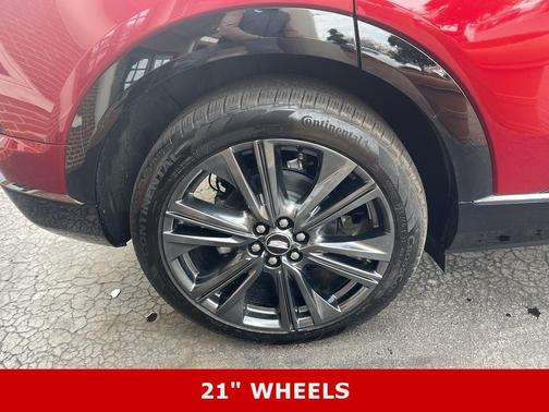 Radiant Red 2025 Cadillac OPTIQ Sport