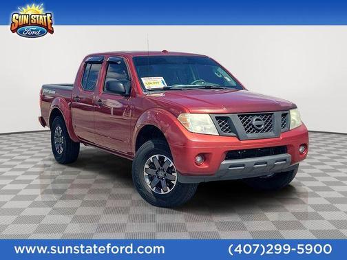 Lava Red 2015 Nissan Frontier Desert Runner