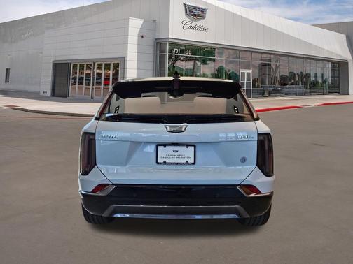 Vibrant White Tricoat 2026 Cadillac OPTIQ Premium Sport