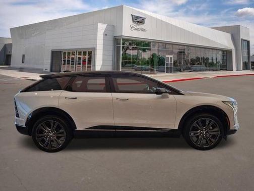 Vibrant White Tricoat 2026 Cadillac OPTIQ Premium Sport