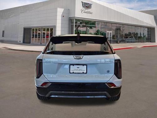 Vibrant White Tricoat 2026 Cadillac OPTIQ Premium Sport