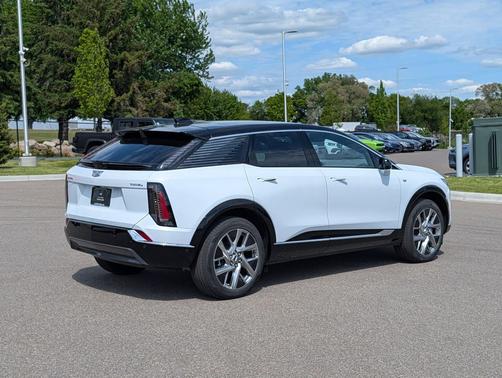 Vibrant White Tricoat 2026 Cadillac OPTIQ Luxury