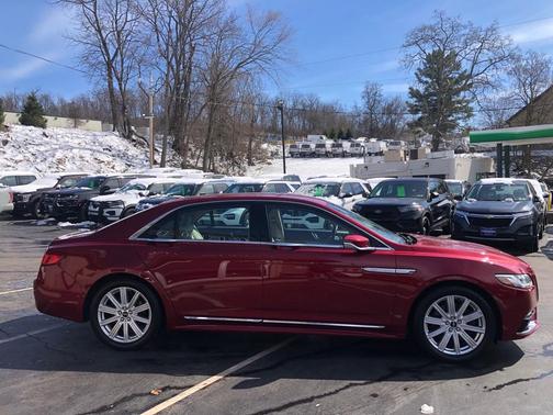 Red 2017 Lincoln Continental Reserve