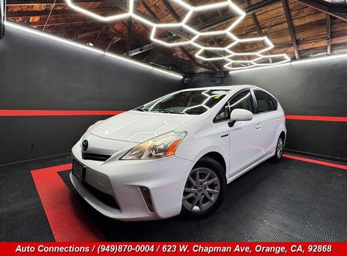 Super White 2014 Toyota Prius v Three