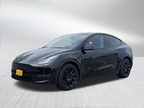 Solid Black 2024 Tesla Model Y Long Range Dual Motor All-Wheel Drive