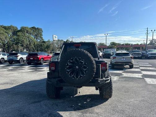 Black Clearcoat 2016 Jeep Wrangler Unlimited Sahara