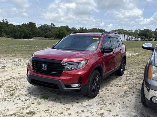 Radiant Red Metallic II 2024 Honda Passport AWD Black