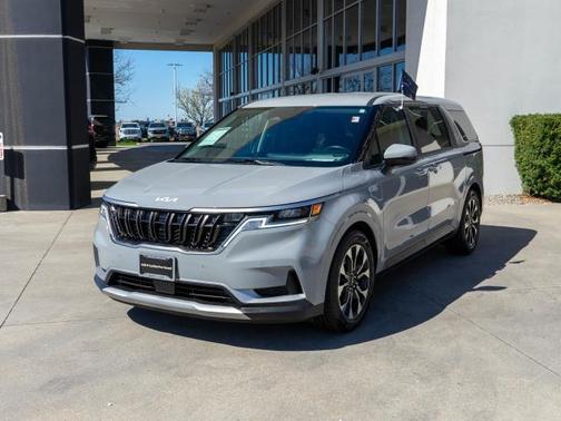 Silver 2024 Kia Carnival EX