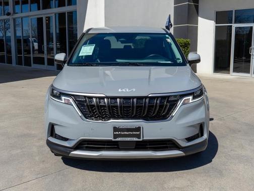 Silver 2024 Kia Carnival EX