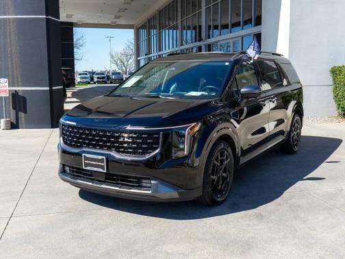 Black 2025 Kia Carnival Hybrid SX