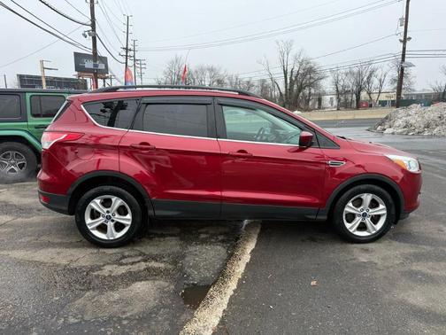 Red 2014 Ford Escape SE