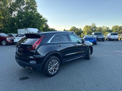 Stellar Black Metallic 2024 Cadillac XT4 Premium Luxury